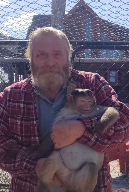 Rolly with a baby monkey